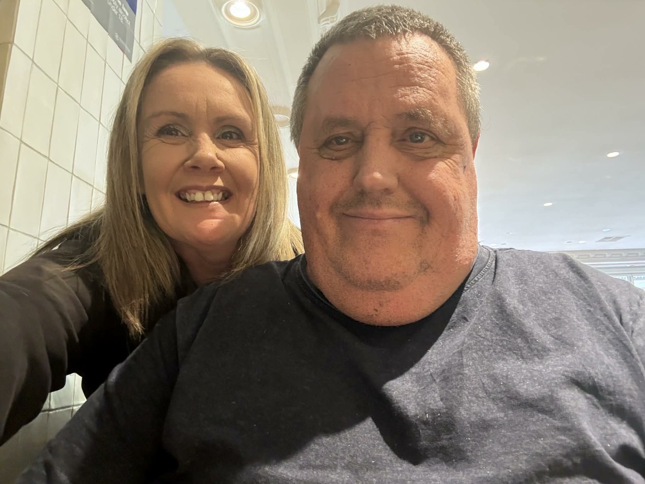 Two smiles close to the camera on a day out together